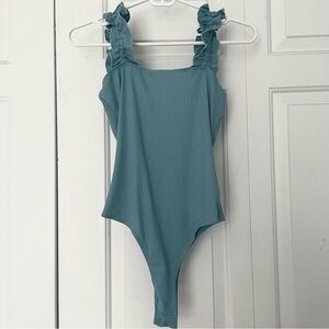 teal bodysuit